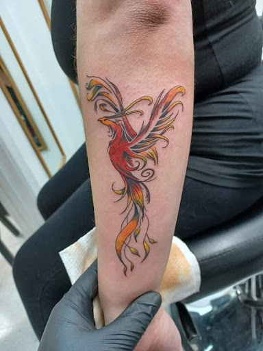 Explore kaws tattoo ideas, creative tattoo ideas in Salem, available at Outwest Tattoo and body piercing ,30 years of tattooing,only life time guarantee