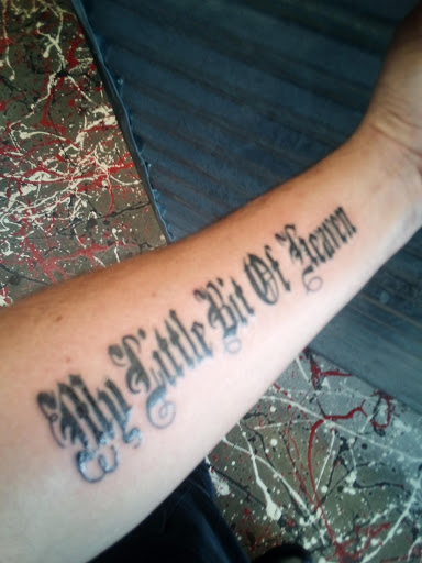 Find lesbian tattoo ideas for your next unique tattoo in Monroe at The House of Ink