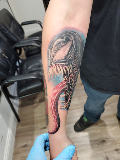 Explore calf muscle tattoo ideas, creative tattoo ideas in Fresno, available at Happy Client Tattoo