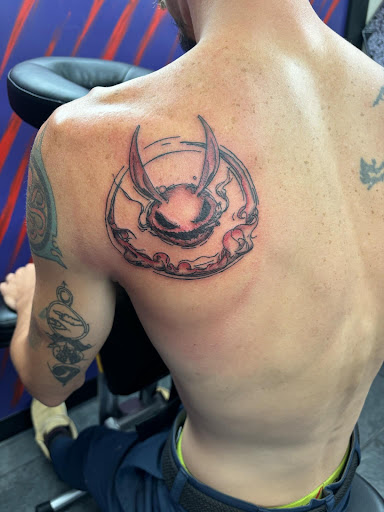 Explore calf tattoo ideas men, creative tattoo ideas in Cadillac, available at Warchief Tattoo, LLC