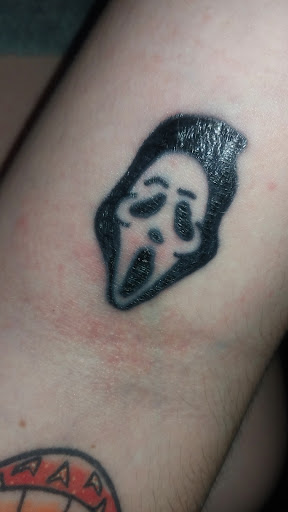 Explore face tattoo ideas woman, creative tattoo ideas in Bakersfield, available at Electric Wizard Tattoo Castle