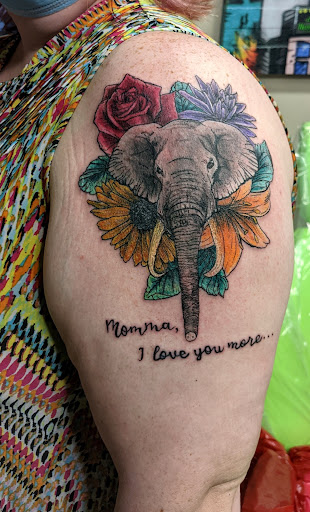Explore thigh tattoo idea, creative tattoo ideas in Pittsburg, available at NeonMoon Tattoo