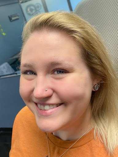 Explore feminine back tattoo ideas, creative tattoo ideas in Springfield, available at Body Piercing By Qui Qui