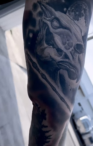 Explore trust no one tattoo ideas, creative tattoo ideas in Arabi, available at Hidden Dimension Studio