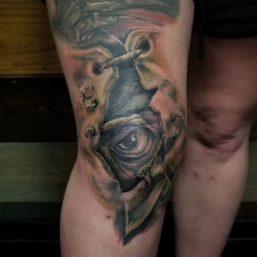 Explore snowboard tattoo ideas, creative tattoo ideas in Talbott, available at Alpha Tattoo co.