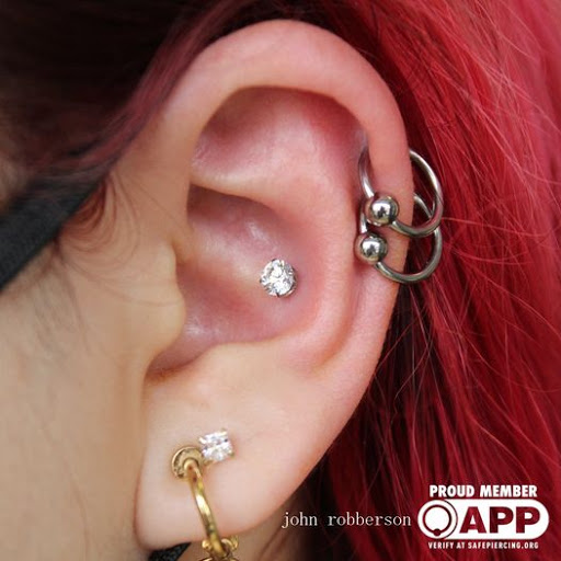 Explore maple leaf tattoo ideas, creative tattoo ideas in Fort Myers, available at Tiger Lotus Tattoo and Piercing