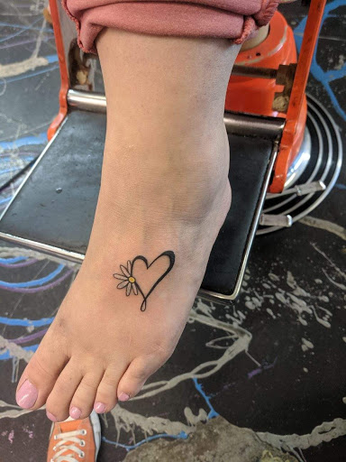 Explore child birth date tattoo ideas for guys, creative tattoo ideas in Redding, available at Caddy Daddys