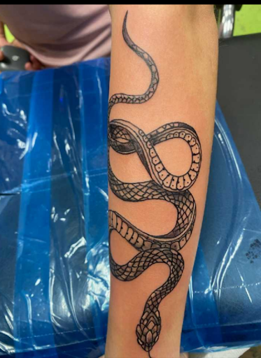 Explore background filler tattoo ideas, creative tattoo ideas in Little Rock, available at THE ORIGINAL ARCH STREET TATTOO COMPANY EST.2014 FBAARON DALE STINSON