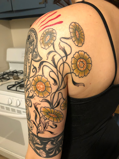 Explore 2 face tattoo ideas, creative tattoo ideas in Glenside, available at Iron Will Tattoo Club