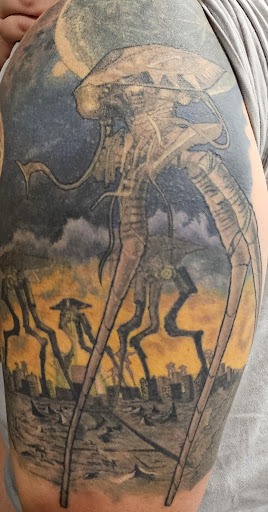 Explore songbird tattoo ideas, creative tattoo ideas in Mesa, available at The Tattoo Lounge