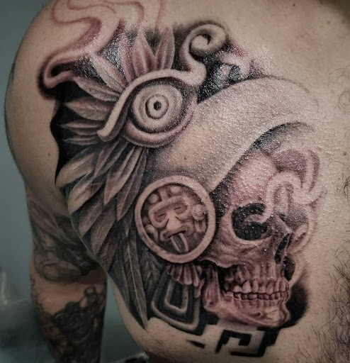 Find tattoo ideas for female chest for your next unique tattoo in Schaumburg at Atmosphere Tattoo Gallery - Schaumburg