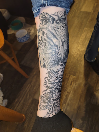 Explore evolution tattoo ideas, creative tattoo ideas in Sioux Falls, available at Permanent Addictions