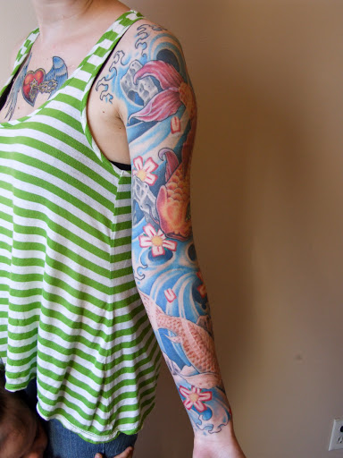 Explore tattoo ideas for family initials, creative tattoo ideas in Louisville, available at Twisted Images