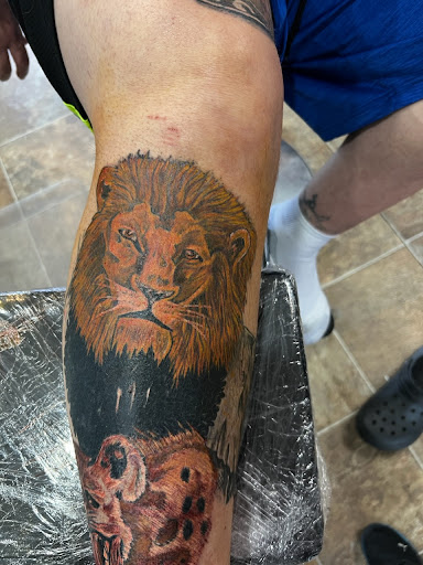 Explore tricep tattoo ideas for guys, creative tattoo ideas in Hebron, available at Sink-N Ink tattoo