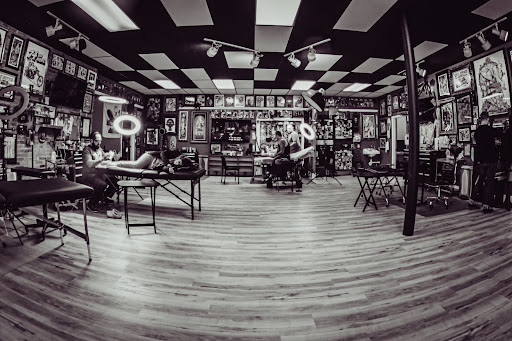 Explore back of neck tattoo ideas, creative tattoo ideas in Bloomington, available at Artkore Tattoo