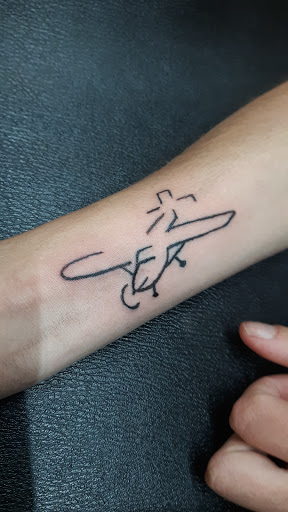 Explore swallow tattoo ideas, creative tattoo ideas in San Angelo, available at Alchemy Tattoo and Piercing Studio