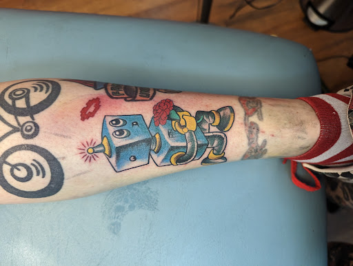 Explore charm tattoo ideas, creative tattoo ideas in Philadelphia, available at Kadillac Tattoo