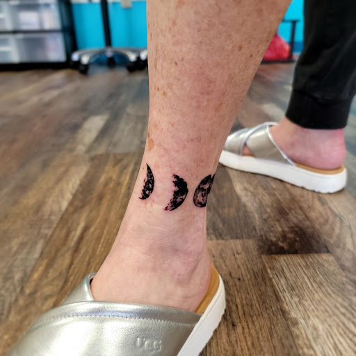 Explore chest plate tattoo ideas, creative tattoo ideas in Traverse City, available at Pinups & Needles