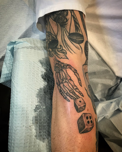 Explore elbow tattoo ideas men, creative tattoo ideas in Libertyville, available at Lucky Seven Tattoo