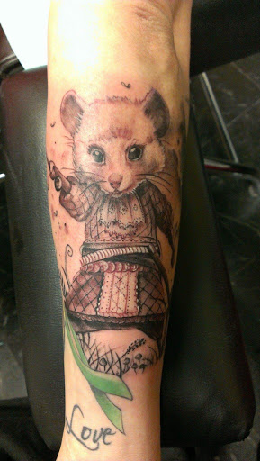 Explore small one piece tattoo ideas, creative tattoo ideas in Savannah, available at Tatlyfe Studios