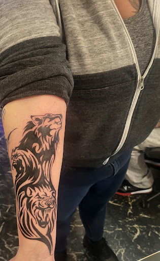 Explore joker hand tattoo ideas, creative tattoo ideas in Galena, available at Garys Professional Tattooing
