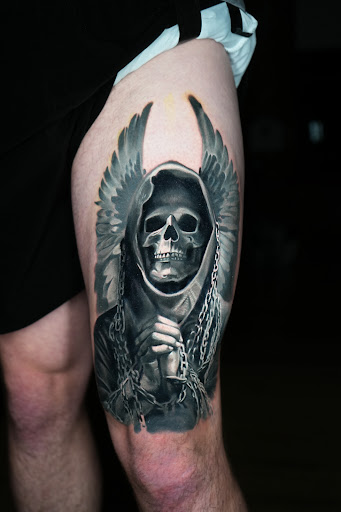 Explore raven tattoo ideas, creative tattoo ideas in Cleveland, available at Studio Three Tattoo shop