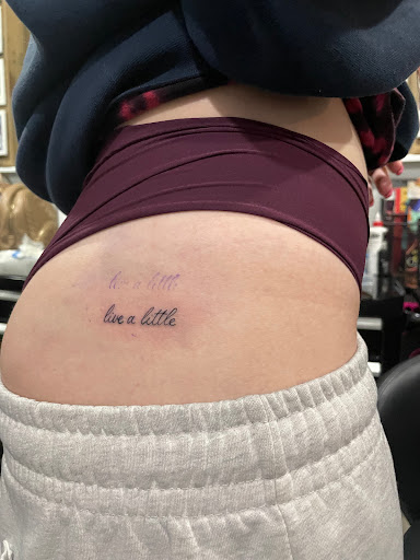 Explore unique tramp stamp tattoo ideas, creative tattoo ideas in Somers Point, available at The Black Rose