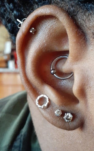 Explore middle of boob tattoo ideas, creative tattoo ideas in Canoga Park, available at Nathans Tattoos and Piercings