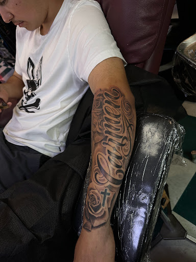 Explore anti government tattoo ideas, creative tattoo ideas in Riverside, available at The Madd Tatterz Tattoo Parlor