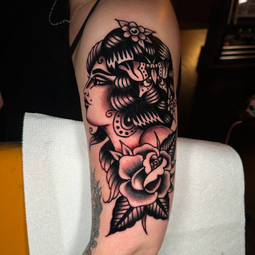 Explore tattoo ideas for mens sleeves, creative tattoo ideas in Johnson City, available at Gold Cross Tattoo Co.