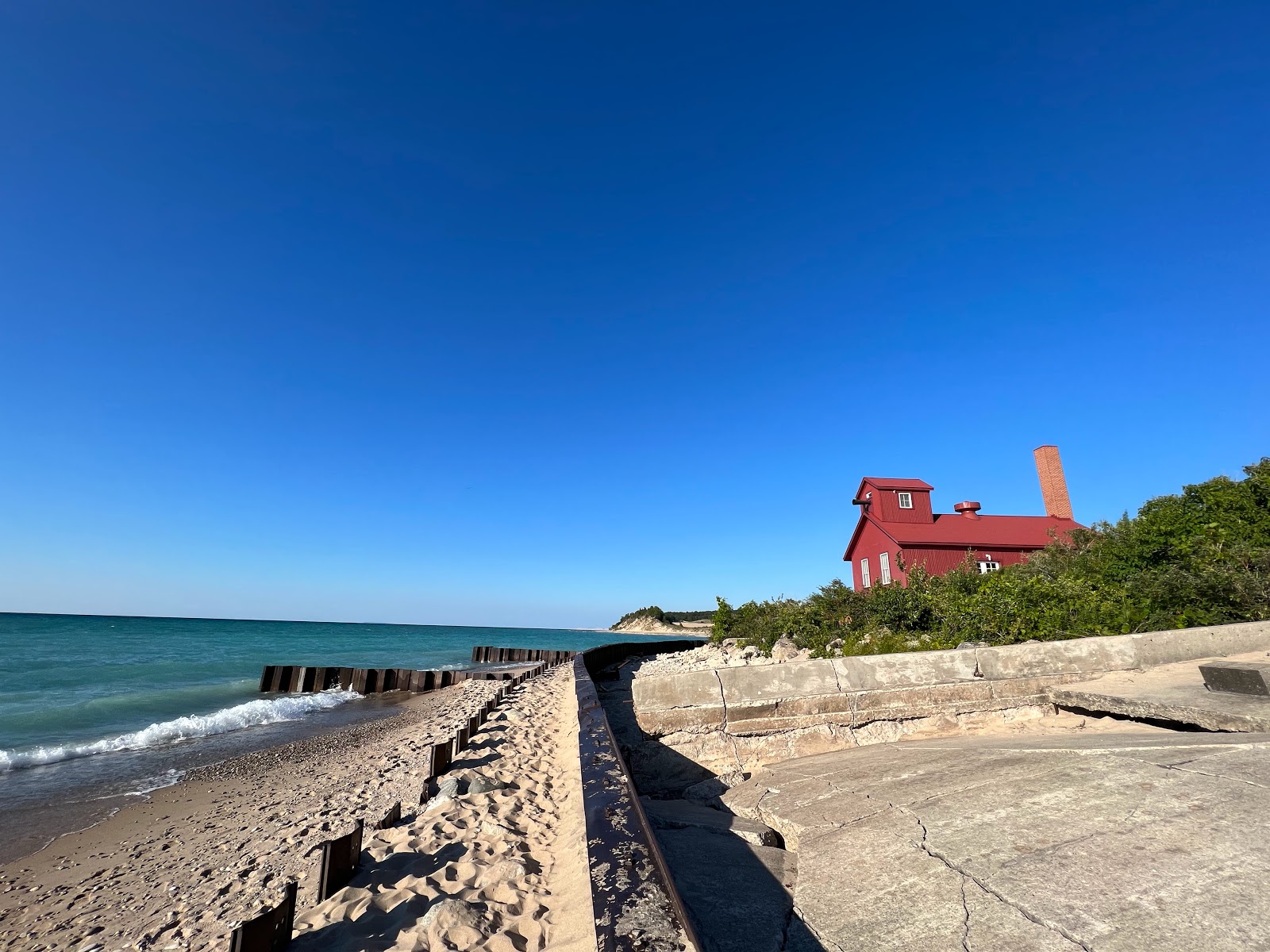 Photo of Point Betsie Beach and the settlement