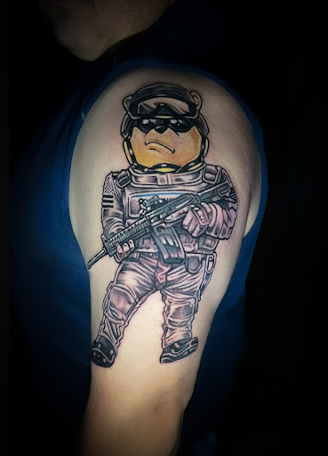 Explore back arm tattoo ideas for guys, creative tattoo ideas in Silver City, available at Independent Ink Tattoo