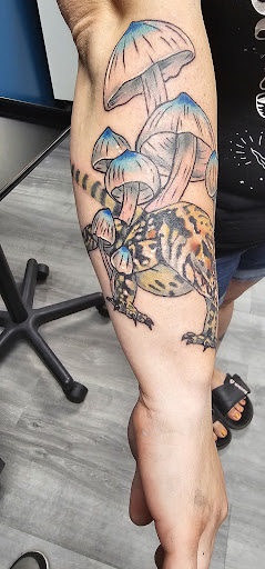 Explore kiss lip tattoo ideas, creative tattoo ideas in Mercer, available at Absolution Tattoo Studio
