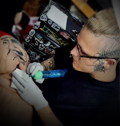 Explore butterfly back tattoo ideas, creative tattoo ideas in Peoria, available at Iron Key Tattoo Studio Inc.