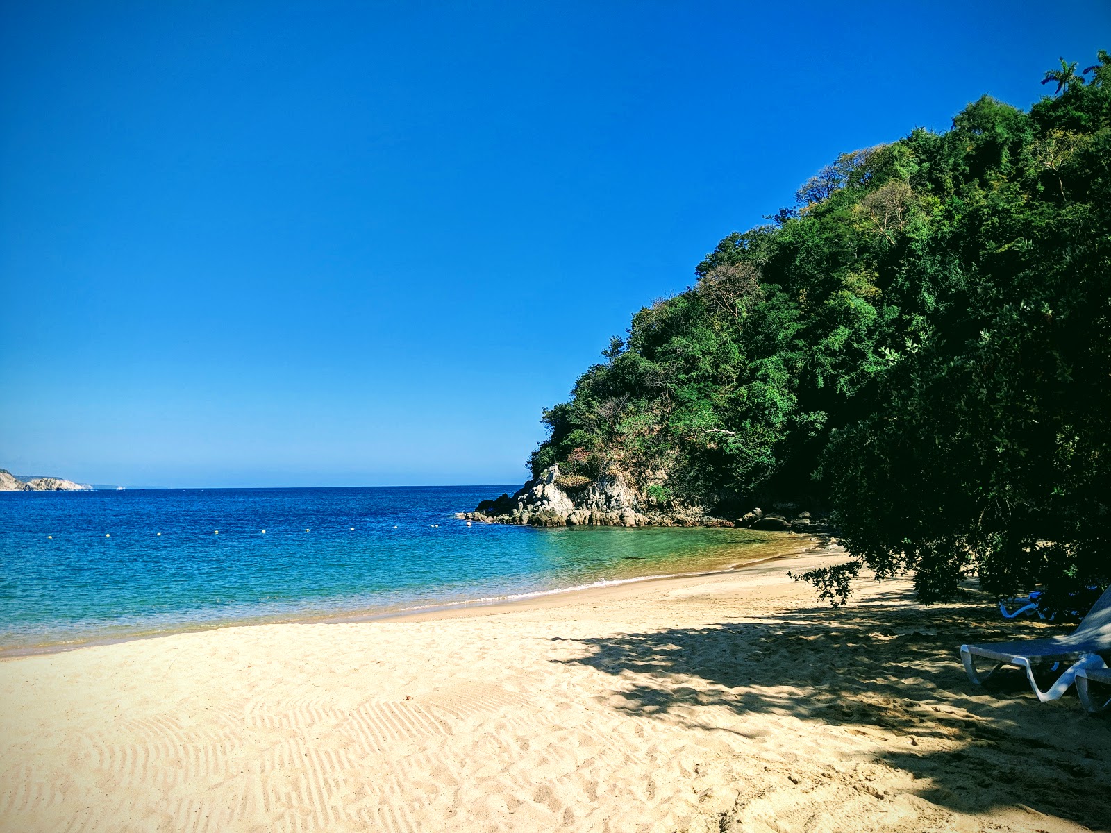 Foto de Tejoncito beach com areia bege fina superfície