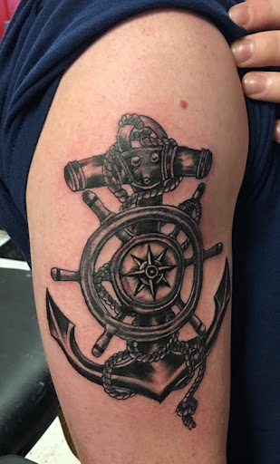 Explore tombstone movie tattoo ideas, creative tattoo ideas in Olympia, available at Redpups LACEY Tattoo CO