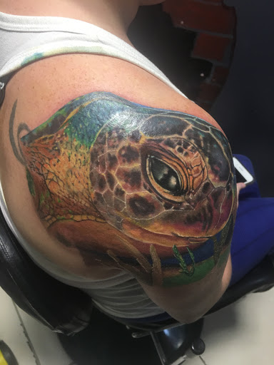 Find best leg tattoo ideas for your next unique tattoo in Cape Coral at The Tattoo Emporium