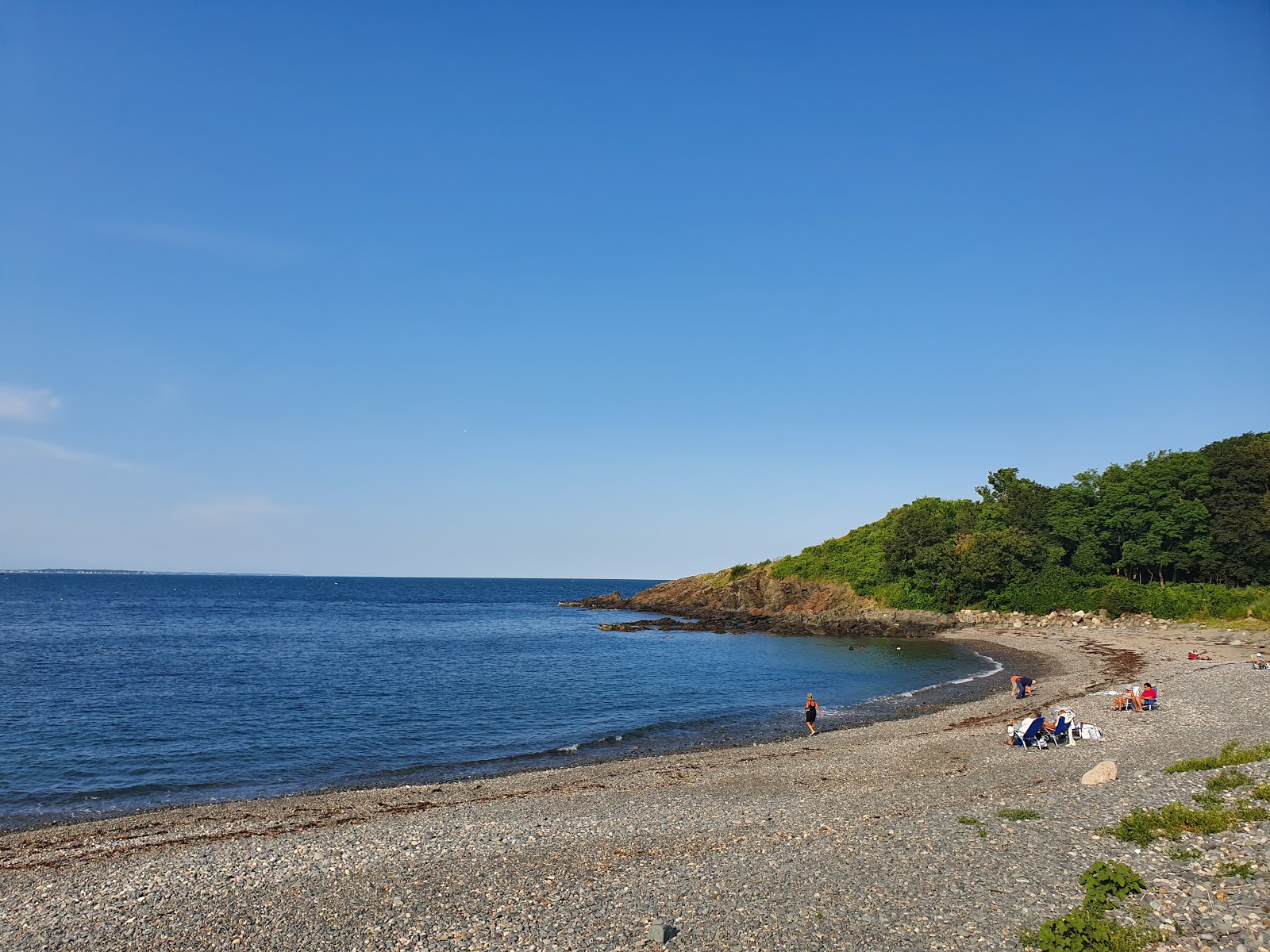 Photo of Canoes Beach with light pebble surface