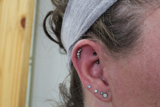 Explore top of hand tattoo ideas, creative tattoo ideas in Omaha, available at Sushi Balloon Body Piercing