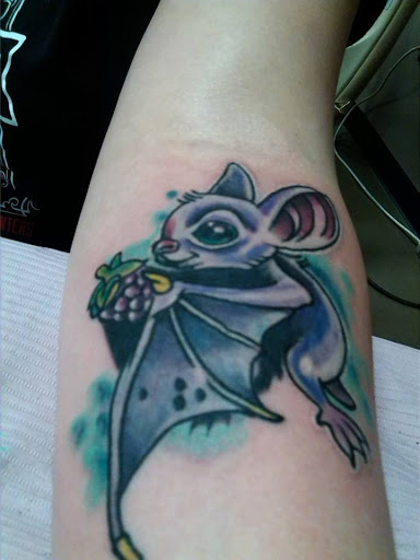 Explore cover up tattoo ideas female shoulder, creative tattoo ideas in Mountain Home, available at Black Dagger Tattoo