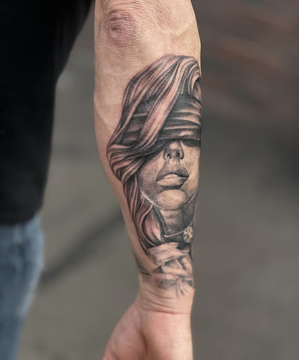 Explore lion tattoo ideas, creative tattoo ideas in Peoria, available at Modern Ink Tattoo