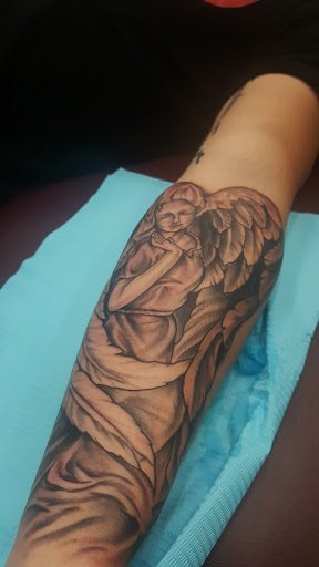 Explore small guy tattoo ideas, creative tattoo ideas in Ocala, available at Lone Wolf Tattoo