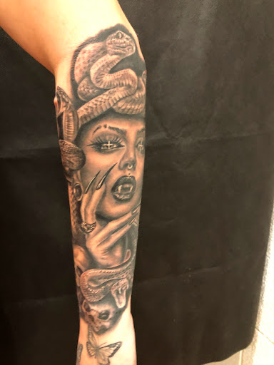 Explore scalp tattoo ideas, creative tattoo ideas in Sarasota, available at SEVEN SINS Tattoo Studio