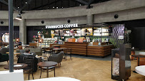 Atmosphère du Café Starbucks aéroport Lyon T1 à Colombier-Saugnieu - n°14