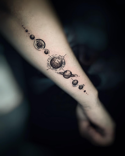 Explore cover up wrist tattoo ideas, creative tattoo ideas in Corona, available at Crop Circles Tattoo Studio