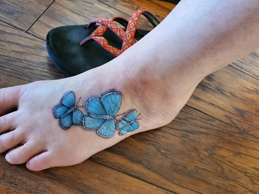 Explore tattoo name cover up ideas on wrist, creative tattoo ideas in Redding, available at Velvet Orange Bodycraft