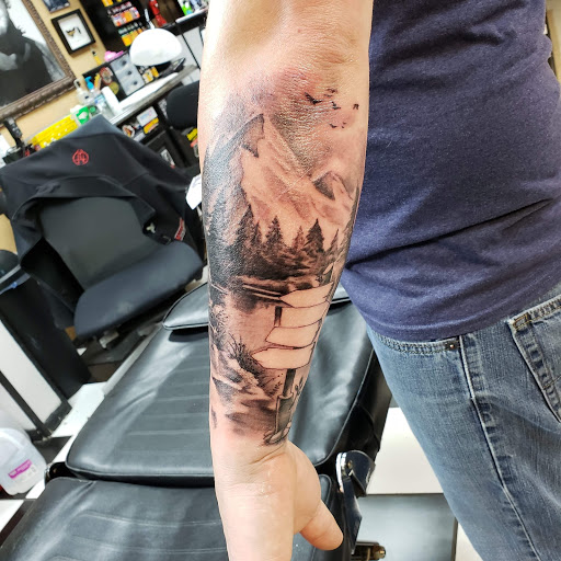 Explore dog outline tattoo ideas, creative tattoo ideas in Whitesboro, available at Nevermore Tattoo