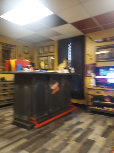 Explore small dragon tattoo ideas, creative tattoo ideas in Warner Robins, available at Untold Pain Tattoo Studio