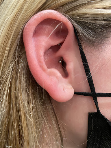 Explore throat tattoo ideas for females, creative tattoo ideas in Trumbull, available at Karma Piercing