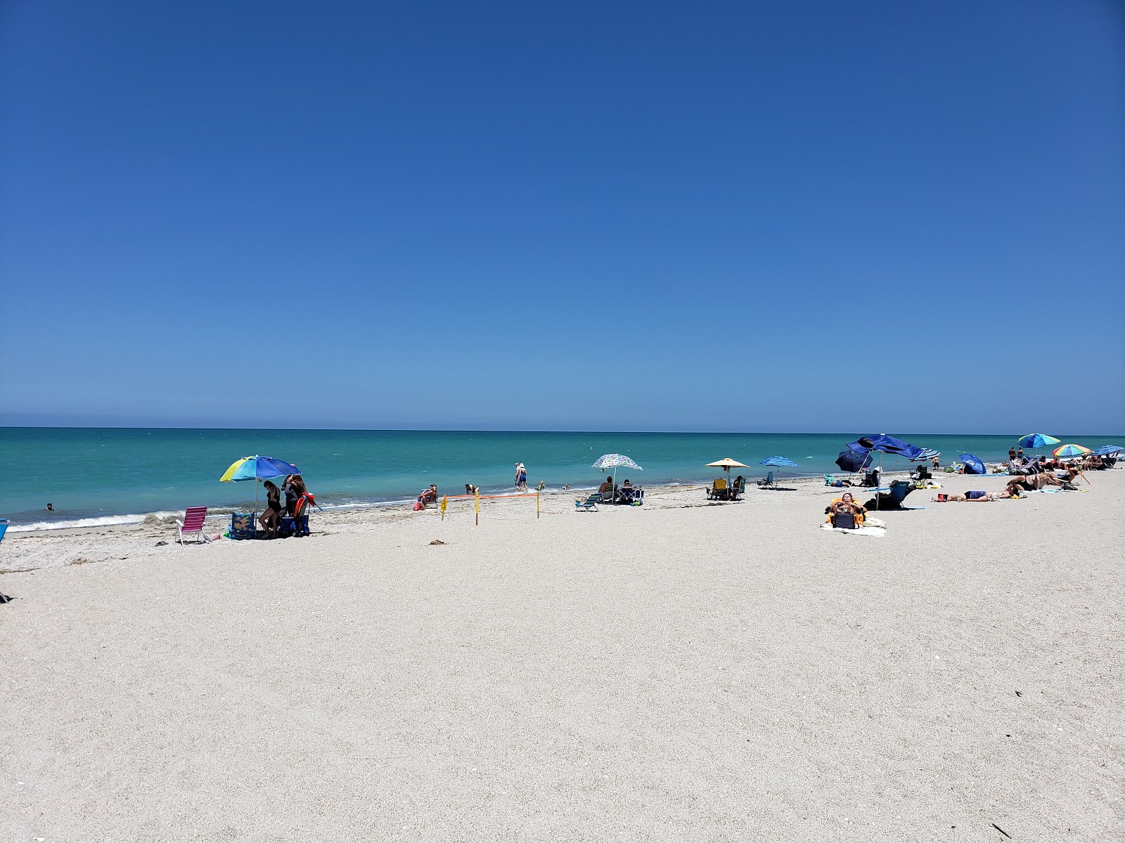 Manasota Key beach的照片 带有碧绿色水表面
